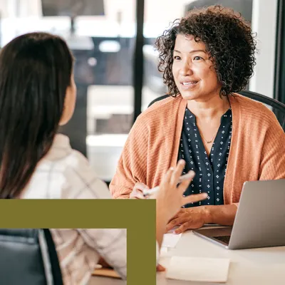 Two women have a meeting.