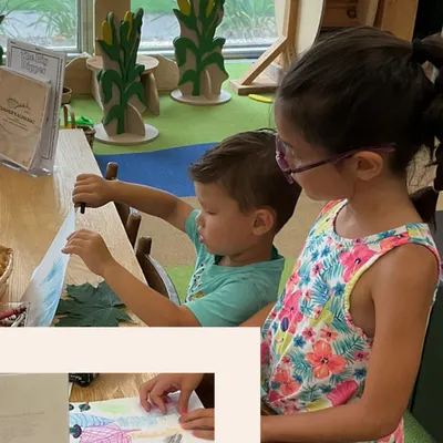 two kids colouring