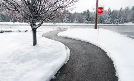 A cleared municipal sidewalk pictured in Clarington’s winter service information.